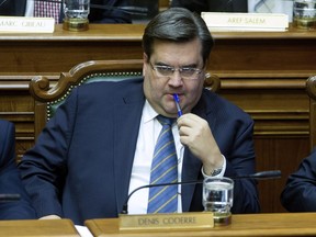 Denis Coderre listens to a question during a council meeting at Montreal city hall in November 2013, weeks after he was elected mayor.