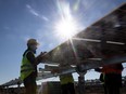 An employee installs new solar panels in Turkey. Clean-tech stocks have caught the imagination of investors across the U.S. and beyond, amid a growing focus on the market implications of climate change.