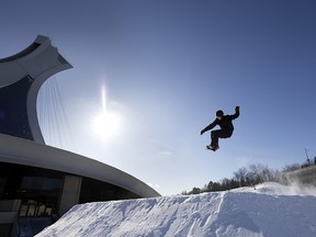 Louif Paradis joins snowboarders and trick skiers on the new snow park slopes at the Olympic Stadium in Montreal.