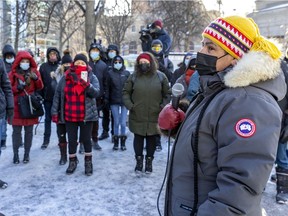 Alexandra Ambroise speaks at a memorial in Cabot Square on Jan. 18 to mark the one-year anniversary of the death of Raphaël André, an unhoused man who froze to death. A speaker at a virtual conference on Wednesday said there are two main thrusts to preventing homelessness: offering support to people on the brink and stopping the conveyor belt that causes people to become unhoused.