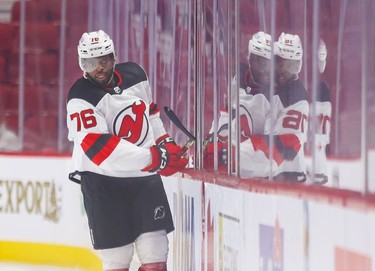New Jersey Devils' P.K. Subban smacks his stick off the glass while heading to the penalty box during second period in Montreal Tuesday, Feb. 8, 2022.