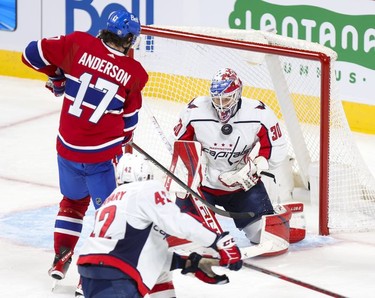 Montreal Canadiens' Josh Anderson can't get his stick on rebound off of save by Washington Capitals' Ilya Samsonov with Martin Fehervary trailing the play during second period in Montreal Thursday, Feb. 10, 2022