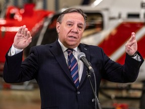 Quebec Premier François Legault speaks during a press conference in Longueuil on Monday February 14, 2022.
