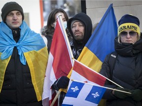 Protesters gathered at a rally in support of the people of Ukraine at the Roddick Gates in Montreal on Feb. 24, 2022.