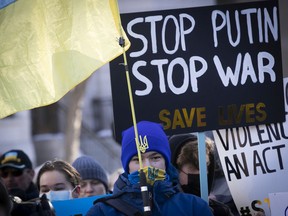 Protesters rally in support of the people of Ukraine at the Roddick gates in Montreal last week. Russian President Vladimir Putin’s  aggression against Ukraine has seen him badly losing the battle of public opinion, experts say.