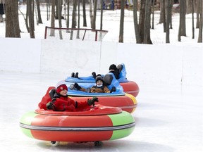 Kids play bumper cars on ice at Parc des Mésanges in Notre-Dame-de-l'Île-Perrot on Sunday.