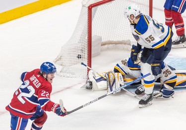 Montreal Canadiens right wing Cole Caufield (22) scores the tying goal against the St. Louis Blues in the dying seconds of the third period in Montreal on Thursday, February 17, 2022.