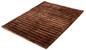 A tufted or high-pile rug adds texture to the room and a tactile warmth underfoot. Casablanca hand-tufted polyester shag, $440, www.ecarpetgallery.com