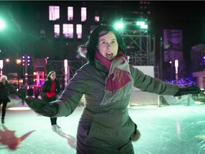 Montreal Mayor Valérie Plante puts on her skates after officially opening the new downtown skating rink at the Esplanade Tranquille on Monday Feb. 21, 2022.