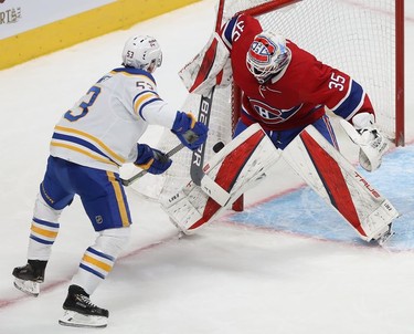 Montreal Canadiens goaltender Sam Montembeault stops shot from Buffalo Sabres' Jeff Skinner (53) during second period NHL action in Montreal on Wednesday, Feb. 23, 2022.
