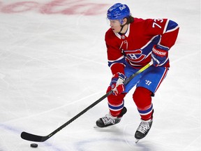 Montreal Canadiens' Tyler Toffoli controls the puck during the first period against the Calgary Flames in Montreal on April 14, 2021.