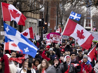 A crowd of several thousand people gather to support the Freedom Convoy movement in Montreal on Saturday, Feb. 12, 2022.
