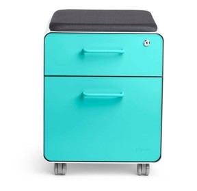 A splash of colour helps to liven up a home office space. Poppin Mini Stow 2-Drawer File Cabinet, aqua, $299, Staples.ca
