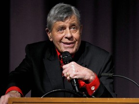 In this Dec. 7, 2011 file photo released by Starz shows comedian Jerry Lewis speaking at the Encore Original premiere of "Method to the Madness of Jerry Lewis" in Los Angeles.