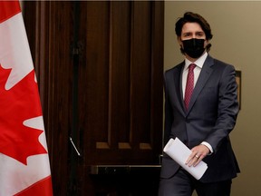 Prime Minister Justin Trudeau arrives at a news conference on Parliament Hill Monday where he announced that the Emergencies Act was being invoked.