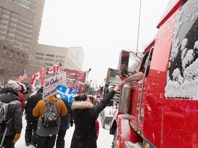 Protesters gathered outside the National Assembly in Quebec City on Feb. 19, 2022.