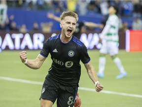 CF Montréal's Djordje Mihailovic reacts after scoring against Mexico's Santos Laguna during the first half of the second leg of their 2022 CONCACAF Champions League soccer game in Montreal, Wednesday, February 23, 2022.