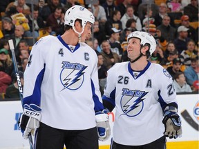 Vincent Lecavalier (left) and Martin St. Louis were teammates for 13 seasons with the Tampa Bay Lightning and won the Stanley Cup together in 2004.