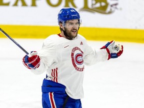 Canadiens' Jonathan Drouin gestures during a competition between the white squad and the red at practice at the Bell Sports Complex in Brossard on Jan. 10, 2022.