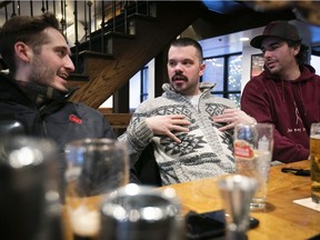Patrons share some stories at the Burgundy Lion restaurant in January. Most people no longer fear touching the same doorknob as you, but they aren’t ready to share your martini, milkshake or beer, Josh Freed writes.