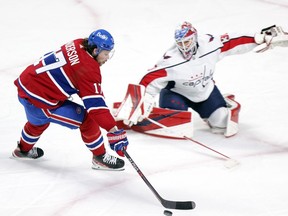 Montreal Canadiens' Josh Anderson has the puck poked away from him by Washington Capitals Ilya Samsonov during second period in Montreal on Feb. 10, 2022.