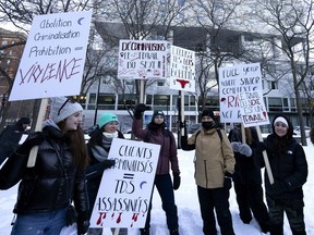 A group of outreach workers from around Quebec gather to mark International Sex Workers' Rights Day in Montrealon Thursday.
