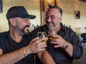 Restaurant Tehran has enjoyed a loyal clientele. "We’ve seen couples who were on their first date, we threw their wedding, and now the kids and grandkids come," says Mehdi Sadegh, left, with Mehrdad Sadegh. The brothers plan to take some time off before finding a new location for their restaurant.