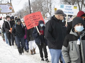 A march in honour of Lucas Gaudet makes its way along Park Ave. on Saturday, March 5, 2022, to denounce violent crimes toward kids and young adults. Lucas Gaudet was 16 when he was stabbed to death in February.