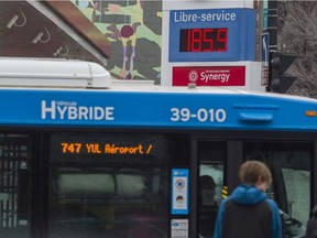 A bus goes by a gas station in Montreal March 11, 2022.