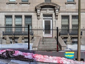 The snow outside the Russian consulate in Montreal is dyed blood red on March 14, 2022.