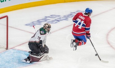 Montreal Canadiens centre Jake Evans (71) leaps in front of Arizona Coyotes goaltender Karel Vejmelka (70) to avoid a shot from the point during 3rd period NHL action at the Bell Centre in Montreal on Tuesday, March 15, 2022.