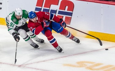 Montreal Canadiens defenseman Alexander Romanov (27) is chased from behind by Dallas Stars centre Tyler Seguin (91) during 1st period NHL action at the Bell Centre in Montreal on Thursday, March 17, 2022.