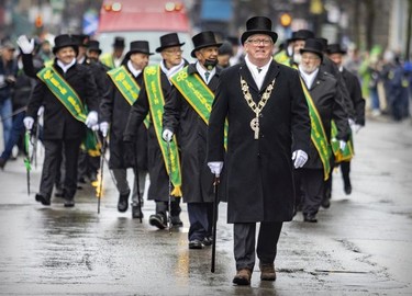 Danny Doyle leads the Erin Sports Association contingent during the St. Patrick's parade in Montreal on March 20, 2022.