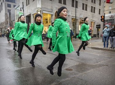 Dancers from Costello Irish Dance perform during the St. Patrick's parade in Montreal on March 20, 2022.