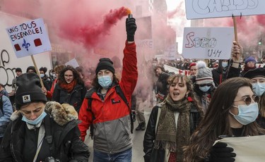 University and CEGEP students and supporters from across Quebec took part in a demonstration/march on Tuesday, March 22, 2022 in Montreal starting at Place du Canada, to demand free tuition. This was on the 10th anniversary of the Maple Spring student protests.