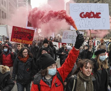 University and CEGEP students and supporters from across Quebec took part in a demonstration/march on Tuesday, March 22, 2022 in Montreal starting at Place du Canada, to demand free tuition. This was on the 10th anniversary of the Maple Spring student protests.