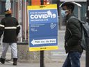 People enter a COVID vaccination clinic in Montreal in March 2022.