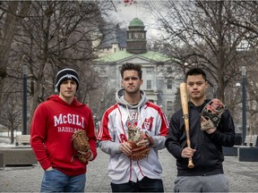 McGill Redbirds baseball players Carlos Vallejos,  James Mulvaney and Chester Dixon, right, on the school's campus in Montreal on Monday March 28, 2022.  They are upset the school has cancelled the baseball program for this season.