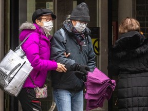 Montrealers wear masks on Thursday March 31, 2022.