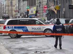 Police were at the scene of a shooting on Notre-Dame St. W. in Old Montreal on Sunday, December 22, 2019.