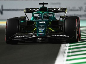 Lance Stroll of Montreal drives the (18) Aston Martin AMR22 Mercedes on track during qualifying ahead of the F1 Grand Prix of Saudi Arabia at the Jeddah Corniche Circuit on Saturday, March 26, 2022, in Jeddah.