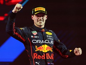 Race winner Max Verstappen of the Netherlands and Oracle Red Bull Racing celebrates on the podium during the F1 Grand Prix of Saudi Arabia at the Jeddah Corniche Circuit on Sunday, March 27, 2022, in Jeddah.