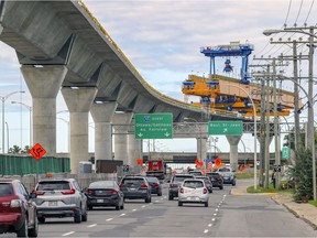 Construction of the Réseau express métropolitain (REM) is about 60 per cent done, SNC-Lavalin says.