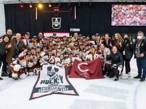 The Concordia Stingers women's hockey team celebrates their national championship win on Sunday, March 27, 2022 in Charlottetown.