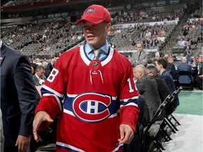 Jordan Harris reacts after being selected 71st overall by the Montreal Canadiens during the 2018 NHL Draft at American Airlines Center on June 23, 2018, in Dallas.