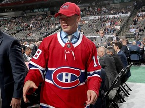 Jordan Harris reacts after being selected by the Montreal Canadiens during the 2018 NHL Draft on June 23, 2018, in Dallas.