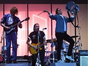 (FILES) This file photo taken on July 15, 2017 shows Arcade Fire performing on the third day of the 26th edition of the "Vieilles Charrues" music festival in Carhaix-Plouguer, western France, on July 15, 2017.