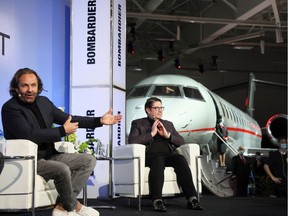 Bombardier Inc, president and CEO, Eric Martel and VistaJet founder and chairman Thomas Flohr are seen in front of their Global 7500 business jet as they celebrate the tenth delivery of the aircraft to VistaJet and 100th delivery overall, in March 29, 2022.