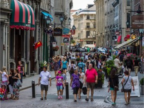 Tourists in Old Montreal in 2013. The city's tourism industry is hoping the easing of testing requirements will bring more people, particularly from the northeast United States, back to the city this summer.