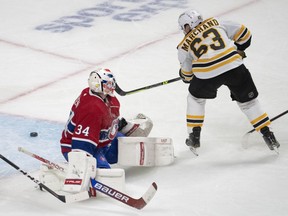 Bruins' Brad Marchand beats Jake Allen for the winning goal in overtime Monday night at the Bell Centre.